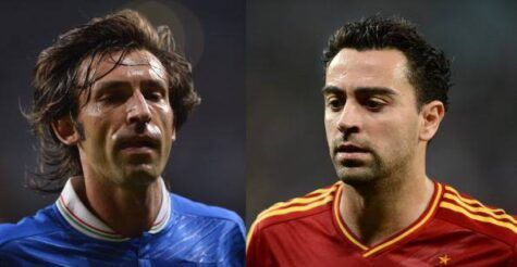 Pirlo-Xavi (Photo credit should read FRANCK FIFE/AFP/GettyImages)